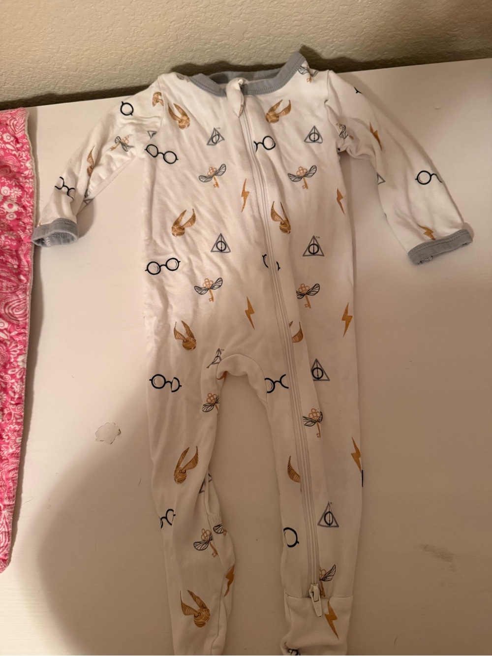 Kyte BABY White Footed One-Piece with Gold & Navy Motifs